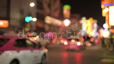 曼谷唐人街灯火辉煌的夜街景色模糊